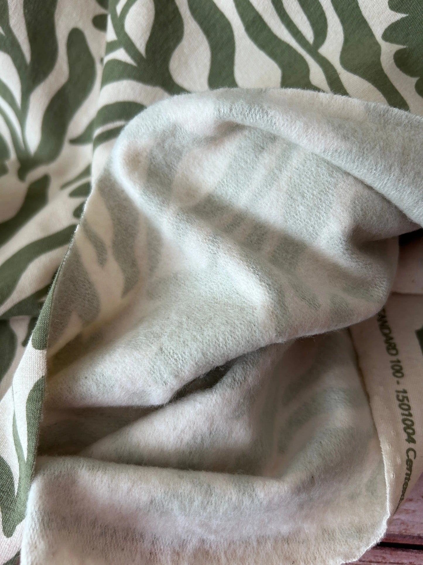 Tissu sweat motif végétal kaki/écru Emilia Fabrics